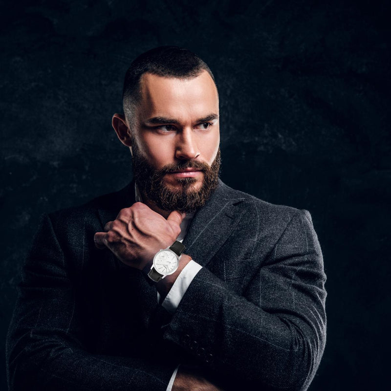 The Classique Dual Time Watch being worn and is a traveler&