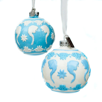 Close-up of embossed Elsa silhouette and star motif on blue fine bone china Christmas ornament