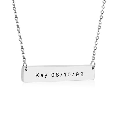 A close-up of the Horizontal Bar Necklace in Stainless Steel, engraved with a name. The 35x8mm bar is sleek and stylish, perfect for everyday wear.