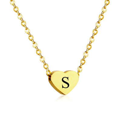 A close-up of the stunning gold heart necklace engraved with the letter "S," highlighting its 18K gold plating, delicate chain, and fine craftsmanship.