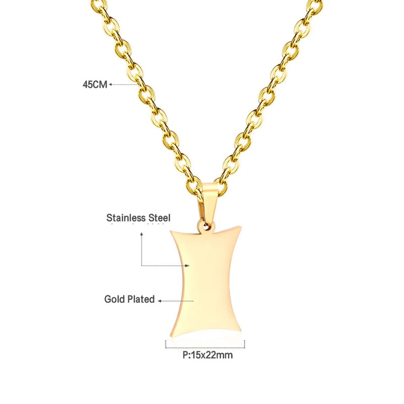 A striking Gothic Shield Necklace in 18K Gold-Plated Stainless Steel, features details and engraving space that enhances its bold and personal design.