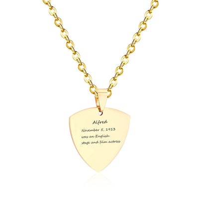 A close-up of the Engravable Shield Necklace in luxurious 18K Gold-Plated Stainless Steel, elegantly inscribed with a personalised message, making it a treasured keepsake.