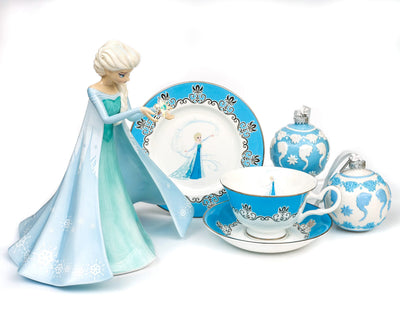 Disney Frozen fine bone china collection featuring Elsa figurine, teacup set and blue-and-white Elsa ornaments