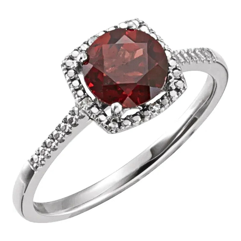 Top View of our 7mm Natural Mozambique Garnet and 0.01ctw Diamond Halo-Style Ring. Crafted from Rhodium Plated Sterling Silver this ladies ring is tarnish resistant and ideal for lovers of gemstones jewellery, garnet jewellery or silver jewellery.