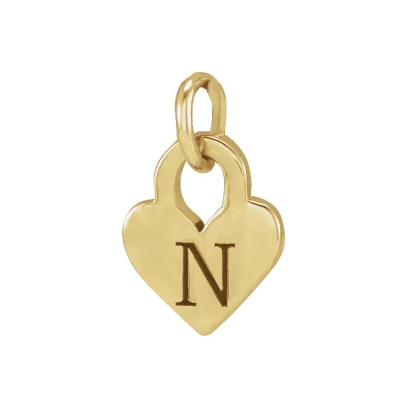 <p>Introducing our enchanting Heart Engravable Charm, crafted in exquisite 14kt yellow gold. Measuring 7.9x4.9 mm, this delicate charm is designed to add a touch of elegance to any ensemble.<br></p> <p>&nbsp;</p>
