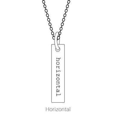 Showcase of the Engravable Bar Necklace in a horizontal layout. The sterling silver bar sits gracefully across the neckline, offering a timeless space for personalised engravings.