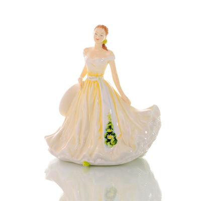 The July Flower of the Month petite figurine is the Water Lily, known for its uniqueness as it is often affiliated with birth and resurrection due to their ability to rise from watery depths. The water lily is a sign for purity, majesty and enlightment.