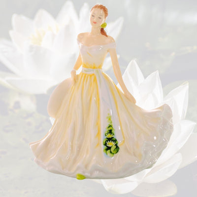 The July Flower of the Month petite figurine is the Water Lily, known for its uniqueness as it is often affiliated with birth and resurrection due to their ability to rise from watery depths. The water lily is a sign for purity, majesty and enlightment.