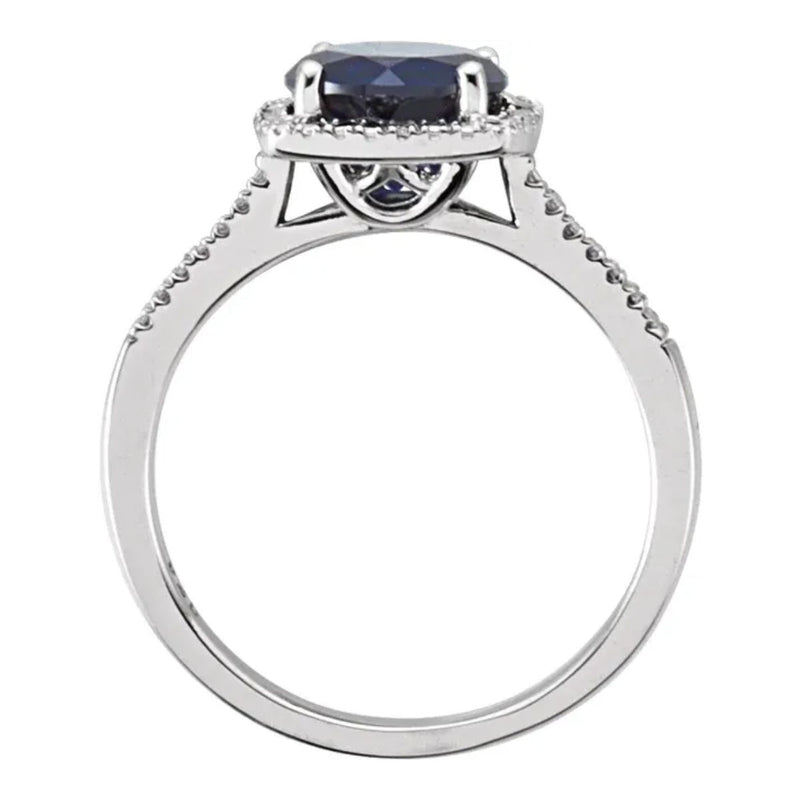 Front view of Discover elegance with our lab-created sapphire and 0.01CTW natural diamond silver ring. This stunning halo-style ladies ring is the perfect gift idea for any occasion. Shop now for a beautiful women&