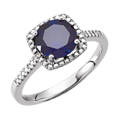 Discover elegance with our lab-created sapphire and 0.01CTW natural diamond silver ring. This stunning halo-style ladies ring is the perfect gift idea for any occasion. Shop now for a beautiful women's ring that combines sophistication and timeless beauty. Ideal for birthdays, anniversaries, and more.