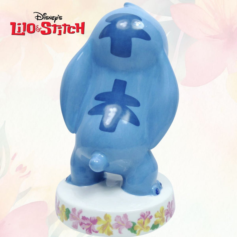 Own this exclusive Lilo & Stitch - Limited Edition Stitch embracing Lilo&