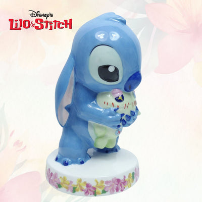 Lilo & Stitch - Limited Edition Stitch Statuette - Hand painted by master artists, this statue is limited to only 500 pieces worldwide, making it a rare and highly sought-after item for collectors. The figurine's vibrant colours and intricate details are breathtaking, with Hawaiian flowers around the base adding extra charm. Shop Now at Jewels of St Leon Jewellery, Giftware and Watches.