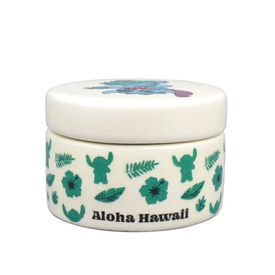 A rear view highlighting the "Aloha Hawaii" text on the back, with lush Hawaiian-inspired motifs wrapping around the base in shades of green.