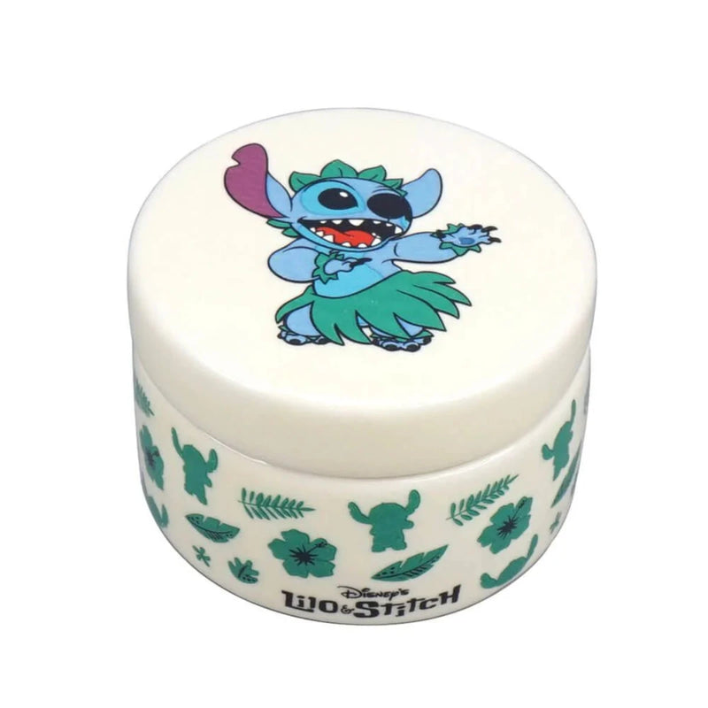 A high-angle shot capturing the full lid design of Stitch hula dancing, along with the colourful tropical details that adorn the entire treasure box.