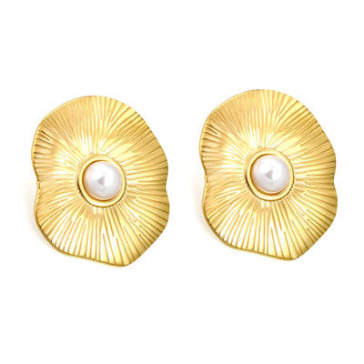 Front-facing product image of asymmetric lotus-inspired gold studs with faux pearls, isolated on pure white for clear detail of radiating grooves.