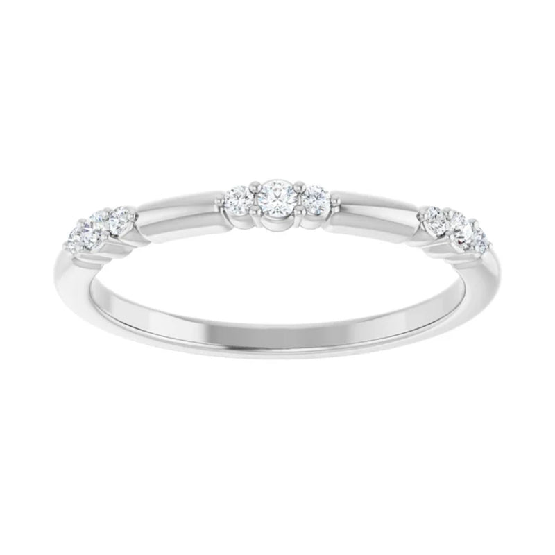 Introducing the 0.10ctw natural diamond stackable ring in 14kt white gold. This fashion accessory is a must-have with nine (9) beautiful natural diamonds. This white gold ring can be worn on its own or as part of a ring stack to create a stunning curated look.