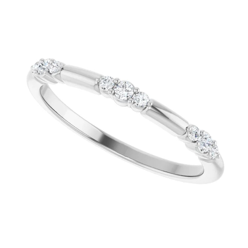 Introducing the 0.10ctw natural diamond stackable ring in 14kt white gold. This fashion accessory is a must-have with nine (9) beautiful natural diamonds. This white gold ring can be worn on its own or as part of a ring stack to create a stunning curated look.