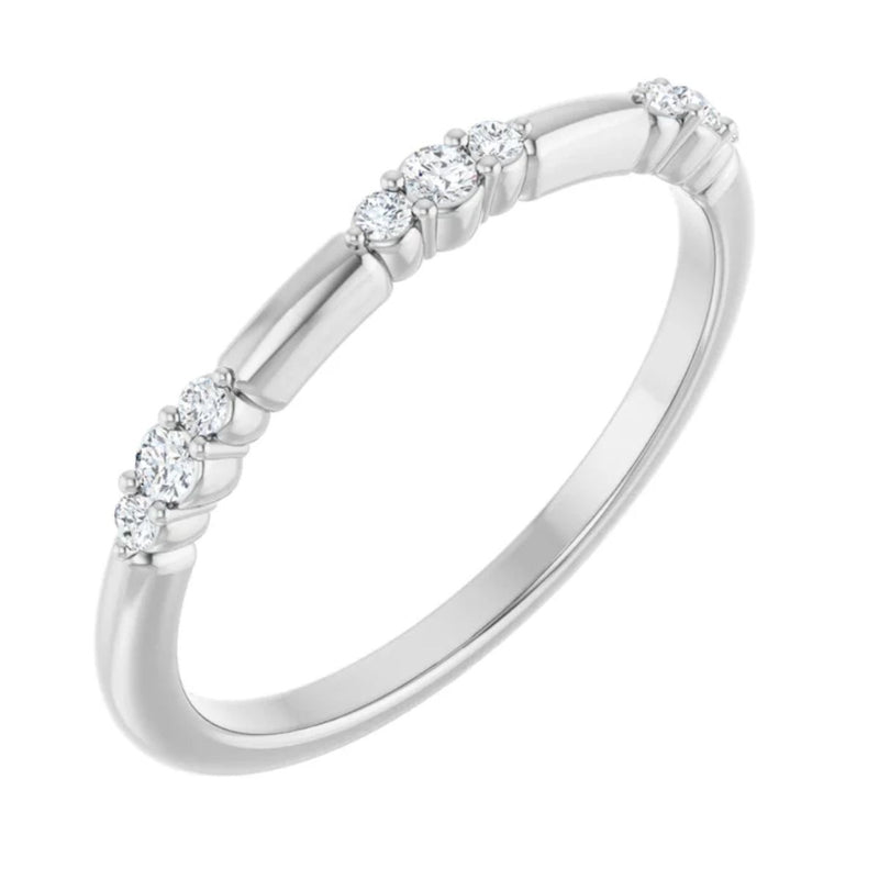 Introducing the 0.10ctw natural diamond stackable ring in 14kt white gold. This fashion accessory is a must-have with nine (9) beautiful natural diamonds. This white gold ring can be worn on its own or as part of a ring stack to create a stunning curated look.