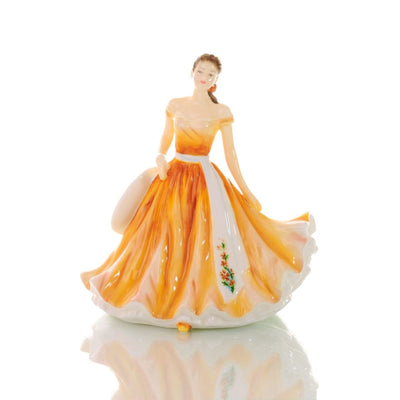 The October Flower of the Month petite figurine is the Marigold, known for its sunny colours; the statue represents optimism, prosperity, and affection, as well as a love charm for those born in the month of October.
