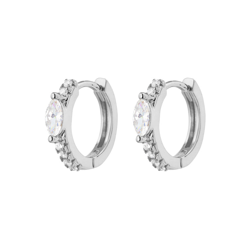 Sterling silver 15x2 mm hoop earrings featuring oval and round cubic zirconia stones, hinged clasp design on white background.