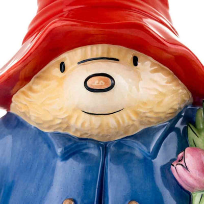 A detailed view of Paddington’s friendly face and vibrant red hat, highlighting the fine craftsmanship and heartwarming expression that makes him so beloved.