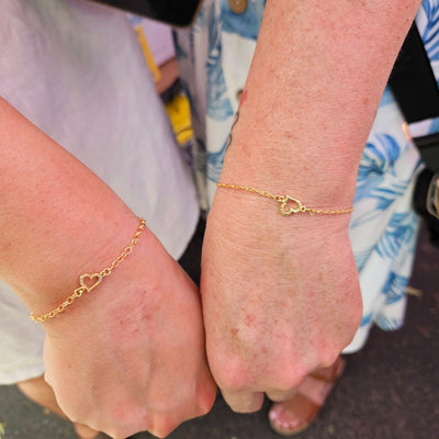 Mother and Daughter getting CZ Gold Heart matching permanent Bracelets - Tamworth Permanent Jewellery and Charms from Jewels of St Leon.
