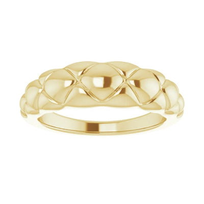 The Quilted Domed Ring crafted from the finest 14K yellow gold. This women's ring is the ideal fashion accessory for work, special occasions or a night out on the town. The gold ring has a quilted diamond pattern and can be a standalone ring or paired with other rings for a unique look.