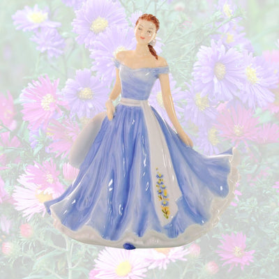 The September Flower of the Month petite figurine is the Aster, once considered sacred by Greek and Roman deities due to its star-shaped appearance. This statue is a symbol of elegance, daintiness and powerful love.