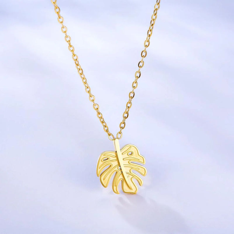 Close-up of the Monstera Leaf Necklace showing the intricate detailing of the 14.4x17mm gold pendant, capturing its lifelike tropical texture.