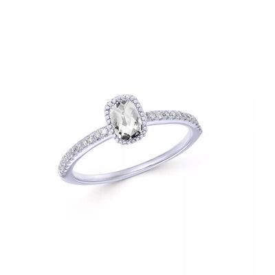 925 Sterling Silver dress ring with a 7 × 5 mm emerald-cut cubic zirconia centre stone encircled by a halo CZs, shown on a plain white background to highlight its polished band and fine detailing.