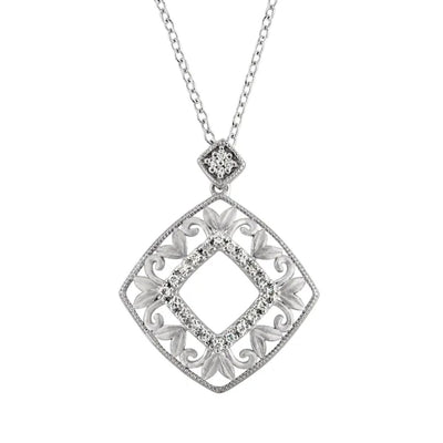0.16CTW  Diamond accented Filigree Sterling Silver Necklace is a stunning addition to any ladies' jewellery collection. Crafted from high-quality rhodium-plated sterling silver, this necklace features intricate filigree detailing that is sure to catch the eye with 24 natural diamond accent adding just the right amount of sparkle to the pendant. Shop Now at Jewels of St Leon