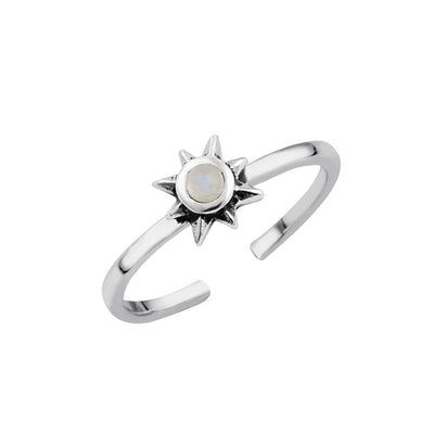 925 Sterling Silver adjustable toe ring featuring a sunburst motif and genuine moonstone cabochon, shown on a plain white background to highlight its polished finish, intricate sun-ray detailing and open adjustable band.