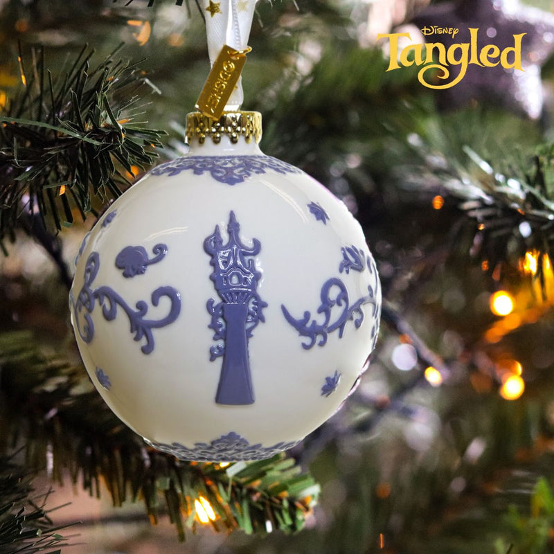 The white background will illuminate against any background, making this ornament stand out and the perfect tree ornament or Christmas decoration. Made from fine china, it is durable and designed to last for years to come. Hang it on your tree or display it on your mantel to add a touch of whimsy and enchantment to your home this holiday season. Add a little magic to your Christmas decor with the Tangled - Rapunzel Christmas Ornament. Shop now at Jewels of St Leon Jewellery, Giftware and Watches.