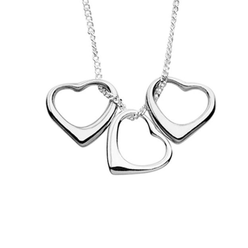 Close-up of the three polished sterling silver hearts, each one representing love, unity, and affection. The floating design adds a modern twist to this timeless symbol, ideal for layering or wearing alone. Shop Necklaces at Jewels of St Leon.