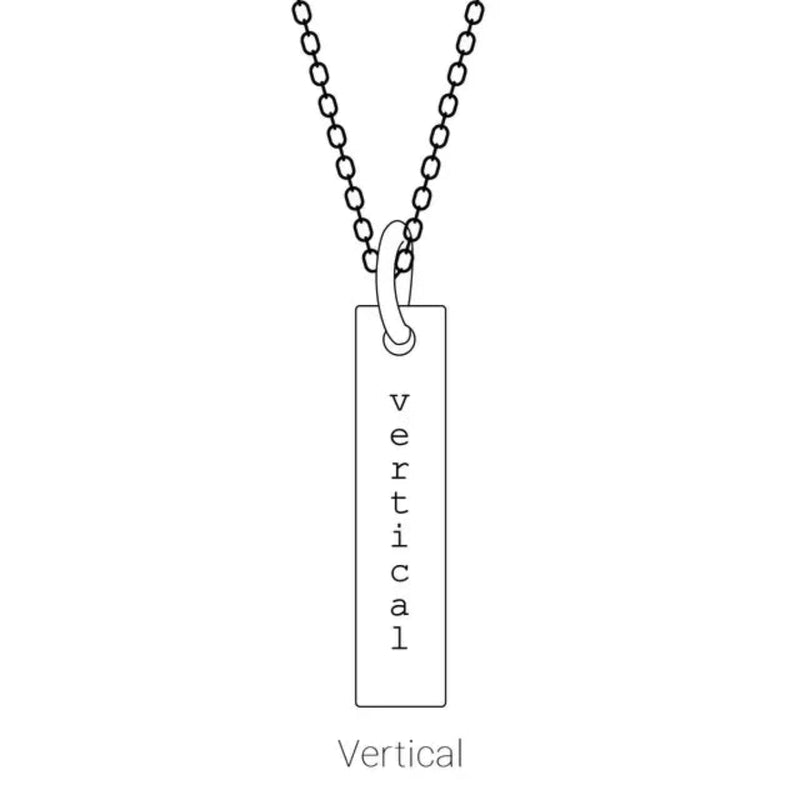 Display of the Engravable Bar Necklace in a vertical orientation. The sleek 17x2.5mm sterling silver bar offers a modern, elongated look, perfect for custom engravings and unique styling.