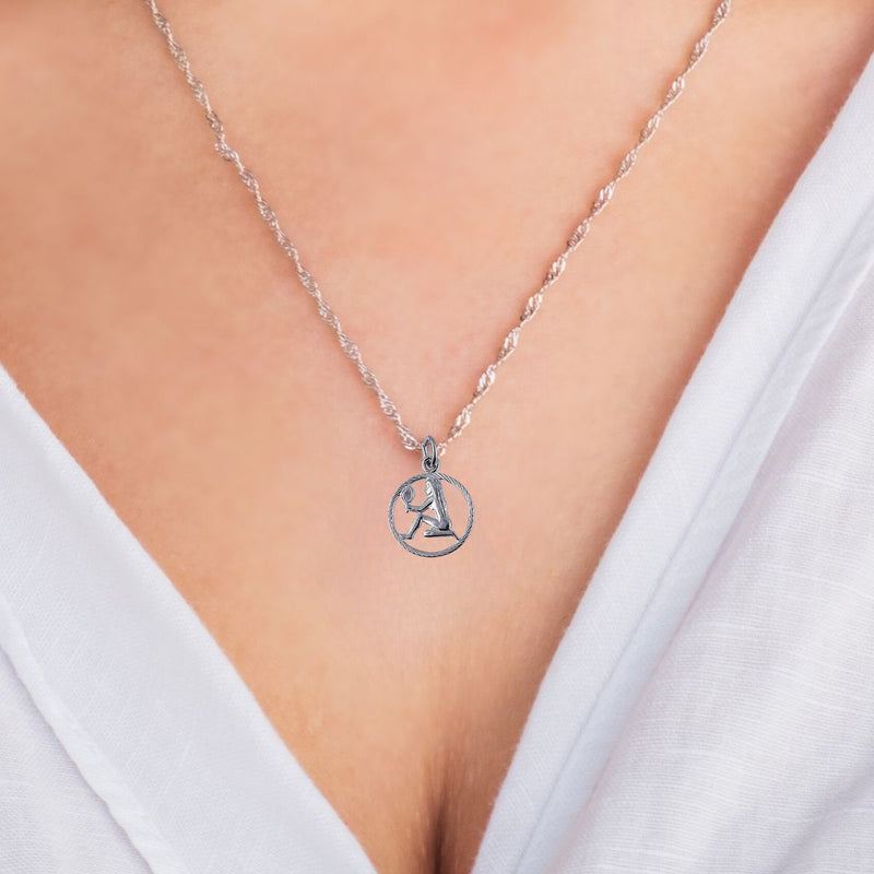 A model wearing the Virgo Zodiac Charm Pendant on a sterling silver chain, showcasing its intricate craftsmanship and polished finish, perfect for adding a personal touch to a necklace or bracelet.