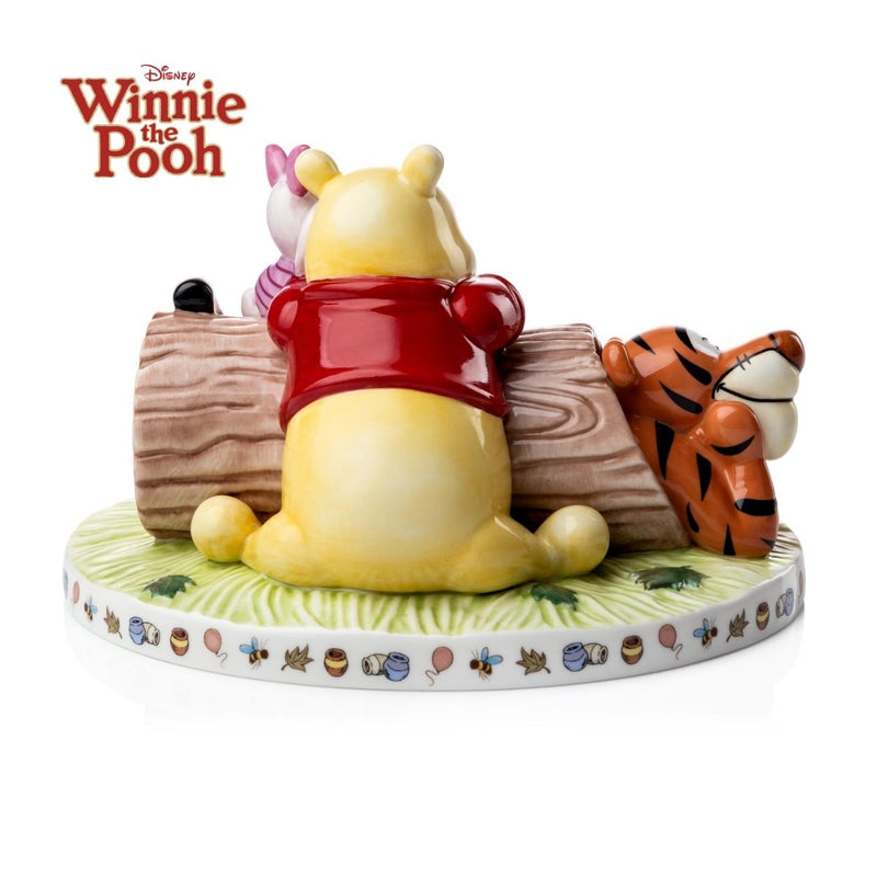 The Here Together, Friends Forever captures the classic characters of One Hundred Acre Wood and celebrates their friendship. The amazingly talented craftsmen have displayed Winnie the Pooh, Piglet and Tigger all cosied up on a tree log. The detailing on the wood and all of the character&