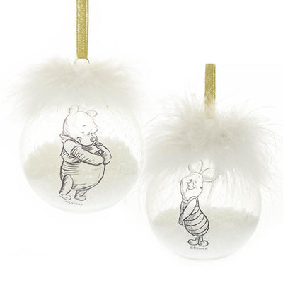 Two clear acrylic baubles featuring Pooh and Piglet illustrations with feather details.