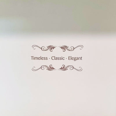 One side of the elegant packaging reads "Time - Classic - Elegant," a perfect reflection of the enduring charm and sophistication of the Winter’s Day figurine. This piece is designed to be a classic heirloom, bringing elegance to any collection.