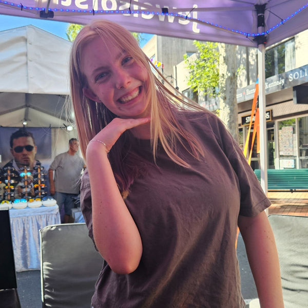 Guest wearing a sterling silver permanent jewellery bracelet at Tamworth Country Music Festival by Jewels of St Leon.