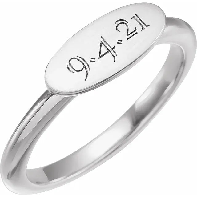Engravable Oval Signet Ring with Engraving in 14K White Gold. Available from Jewels of St Leon.