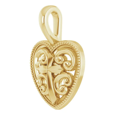 This Heart with Cross Pendant in 14K Yellow Gold is an exquisite piece of ladies' jewellery. The beautiful heart design features swirling scrolls with a cross in the centre, making it a perfect symbol of faith and love. The ornate details on this gold pendant are stunning, and the pendant dimensions of 18.74 x 12.68 mm make it the ideal size for everyday wear. Shop now at Jewels of St Leon.