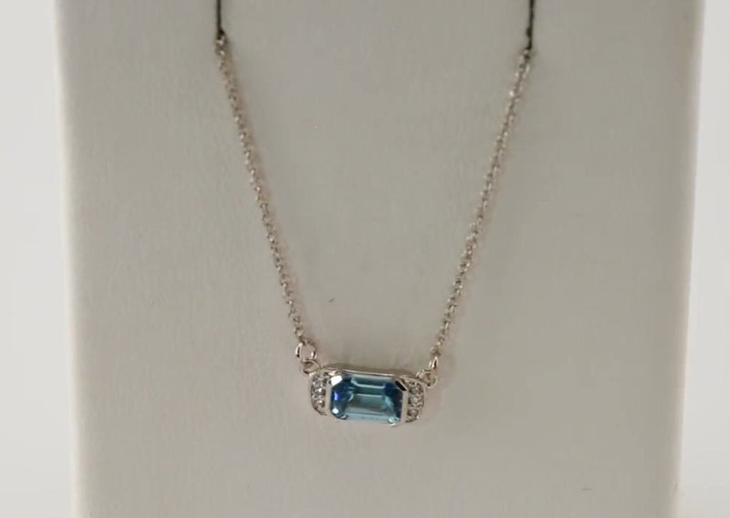 This stunning piece of jewellery features a 6x4mm natural aquamarine gemstone, the birthstone for March, and is accented with natural diamonds set in rhodium-plated 14K white gold bar. The 40cm chain completes the elegant look. Perfect for adding a touch of sophistication and style to any outfit, this necklace is a must-have for any fashion-forward individual. Available from Jewels of St Leon Online Jewellery Australia