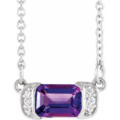 Amethyst and Diamond Bar Necklace, crafted in high-quality sterling silver. The centrepiece of this necklace is an elegant 5.48x11.65mm bar pendant featuring a sparkling emerald-cut 6x4mm Amethyst gemstone in the centre, surrounded by six dazzling 0.02ctw diamonds on either side. The pendant hangs from a 40cm length chain. Available from Jewels of St Leon Online Silver Jewellery Australia.