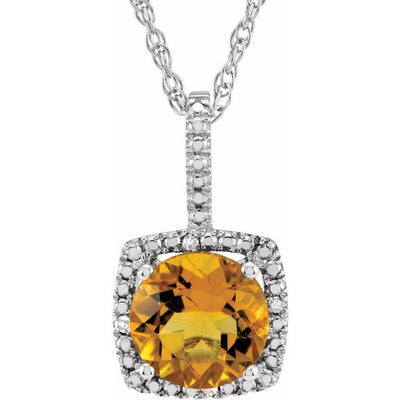 Stunning Citrine and Diamond halo-style sterling silver necklace, crafted with the finest materials to create a truly exquisite piece of jewellery. This necklace features a 7mm citrine centre stone, which is the November birthstone and is surrounded by 0.015ctw diamond accents in a halo-style setting. The pendant measures 15.7x8.9mm and hangs from a 45cm chain, making it the perfect length for everyday wear. Available from Jewels of St Leon Online Jewellery Australia