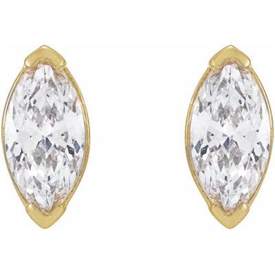 The 4x2mm Marquise Shaped, Natural Diamonds are meticulously crafted into petite diamond stud earrings, measuring 4.87x2.82mm in size, making them the perfect fit for any woman seeking a classic and timeless look. Available from Jewels of St Leon Online Diamond Jewellery.