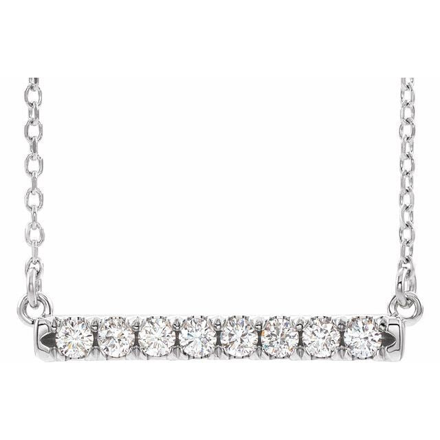 Splendid 0.50CTW Lab-Grown Diamond French-Set Bar Necklace the perfect addition to any jewellery collection. This elegant piece boasts an adjustable 40-45cm chain length, ensuring a comfortable and customisable fit for any wearer. The 25.9x4.4mm 8-stone bar pendant features high-quality lab-grown diamonds, adding a touch of luxury to any outfit. Available from Jewels of St Leon Online Jewellery Australia.