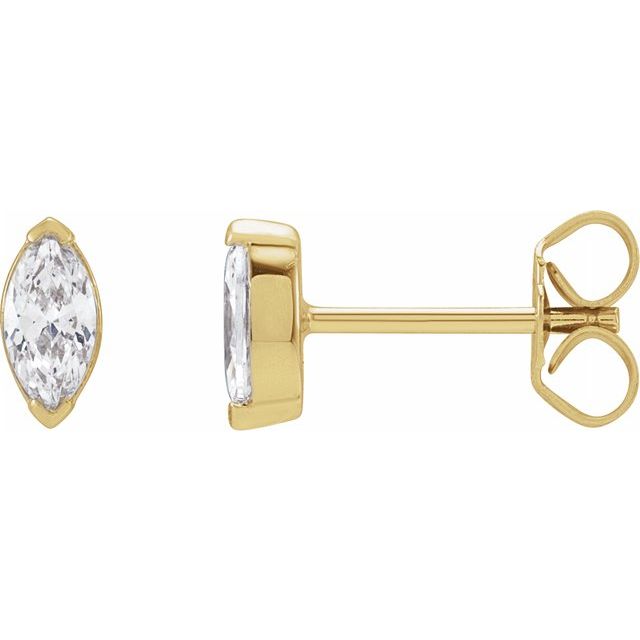 The epitome of elegance with these stunning 14K Yellow Gold Marquise Natural Diamond Earrings. The 4x2mm Marquise Shaped, Natural Diamonds are meticulously crafted into petite diamond stud earrings, measuring 4.87x2.82mm in size, making them the perfect fit for any woman seeking a classic and timeless look. Available from Jewels of St Leon Online Diamond Jewellery.