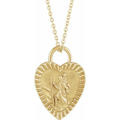 St. Christopher Heart-Shaped Medal with match chain. Crafted from solid 14K gold, this 20x13mm medal has St. Christopher carrying the baby Jesus on his shoulder. Available in Australia from online jewellery store Jewels of St Leon.