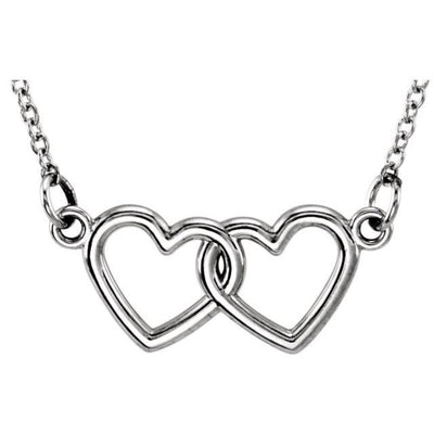 This Double Heart Necklace in Sterling Silver from Posh Mommy's Tiny Posh Collection is a must-have for any woman who wants to add a touch of romance to her jewellery collection. Whether you're looking for a gift for a loved one or simply want to treat yourself, this necklace will indeed become a cherished piece for years to come. Shop now at Jewels of St Leon.